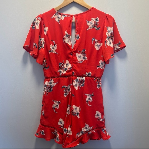 Sienna Sky Floral Romper | Short Flutter
Sleeve Romper - Picture 3 of 8